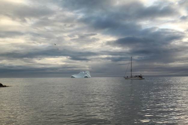 A sailboat anchored near Pond Inlet waiting for weather to transit through the Northwest Passage