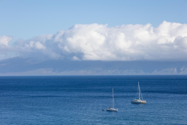 Sailboat in the open sea Calm sea sailing luxury summer adventure active vacations Maui Hawaii