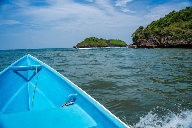 Sailing around the rocks on the ocean of pacitan indonesia