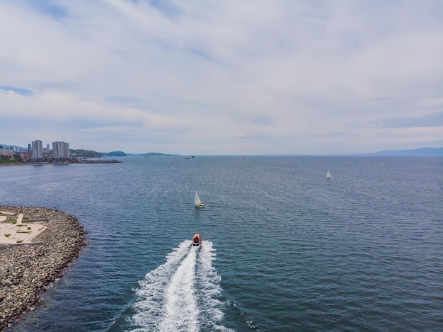 Sailing boat from drone at windy day