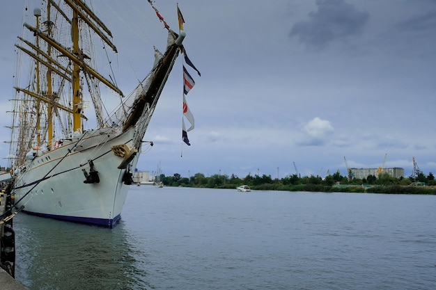 Sailing ship moored to the pier big sailing ship