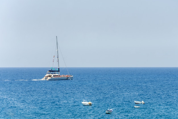 Sailing ship yachts in the open sea.