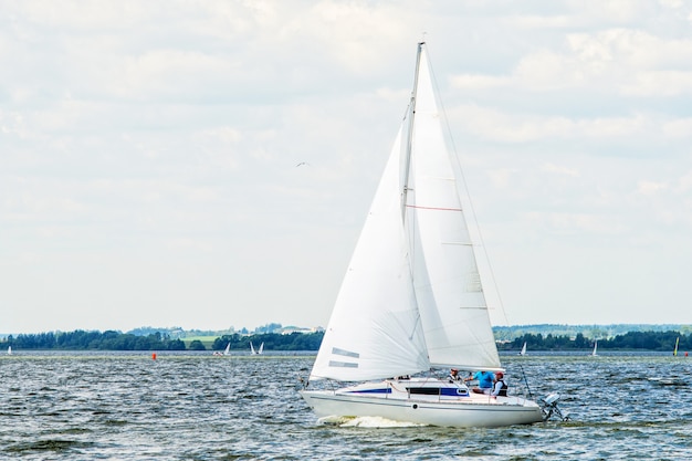 Sailing yacht goes to the bay