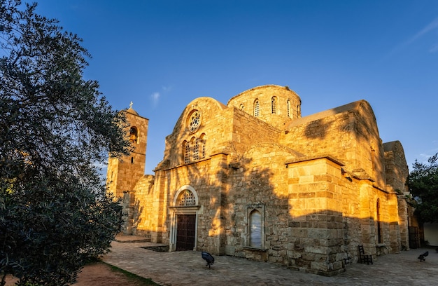 Saint apostle Barnabas monastery and the bell tower in sunset rays near Famagusta North Cyprus