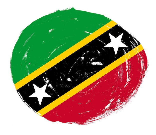 Saint kitts en nevis vlag geschilderd op een verontruste witte penseelstreek achtergrond