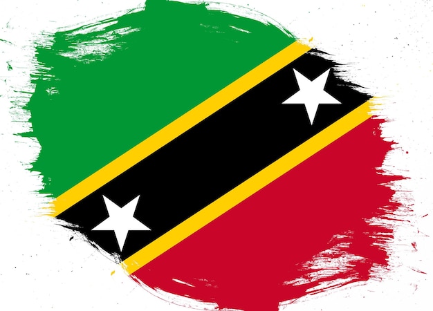 Saint kitts en nevis vlag op noodlijdende grunge brush achtergrond