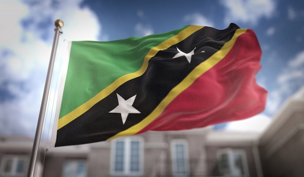 Saint Kitts and Nevis Flag 3D Rendering on Blue Sky Building Background 