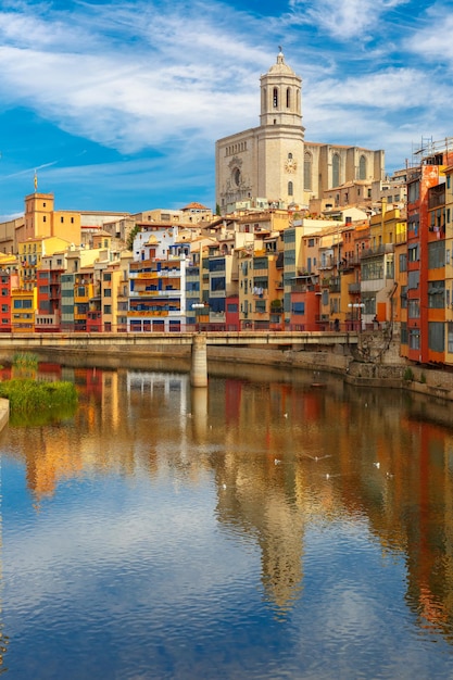 Saint mary cathedral colorful yellow and orange houses and famous white house casa maso reflected in...