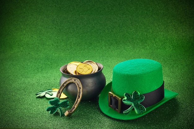 Saint patricks day pot full of gold green hat and shamrock