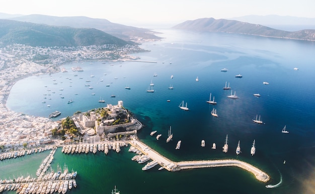 Saint Peter Castle and marina Bodrum Turkey castle with Sailing ship yachts in sea from above