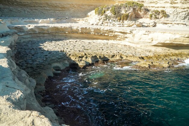 Saint peter pools Malta rock formation hole on rocks