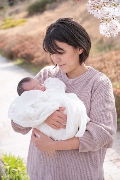 Sakura newborn baby and mother