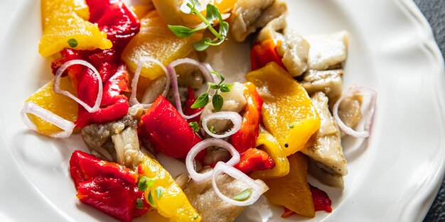 salad baked vegetables eggplant pepper onion vegetable food healthy meal food snack on the table