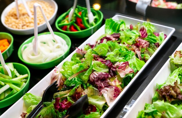 Photo salad bar buffet at restaurant fresh salad bar buffet for lunch or dinner healthy food