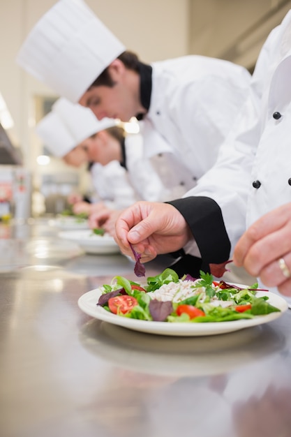 Salad being garnished