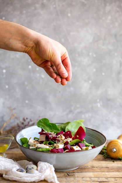 Salad. The concept of proper nutrition. Season the salad.