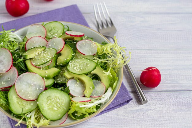 Salad of fresh cucumbers, spinach leaves, arugula, avocado.
served with slices of eggs and red pepper.