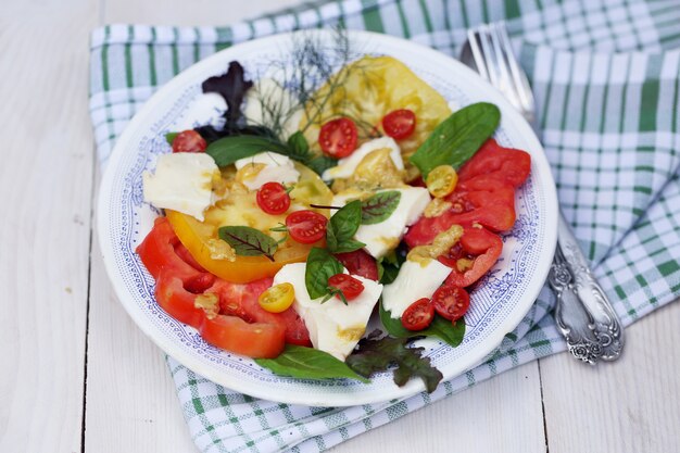 Salad of Fresh tomatoes with goat cheese