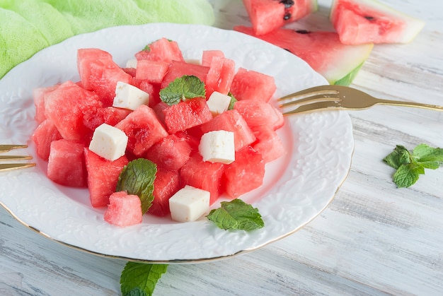 Salad from watermelon and suluguni with mint