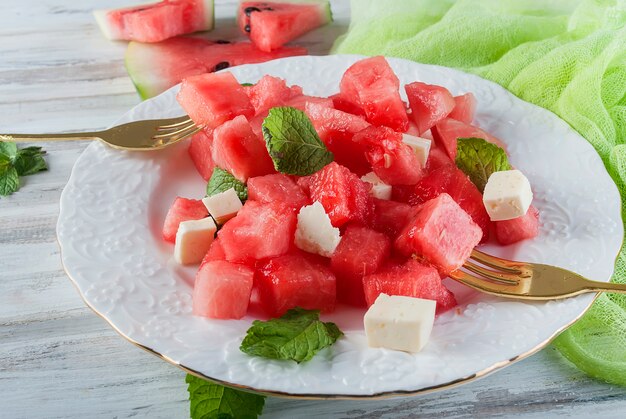 Salad from watermelon and suluguni with mint