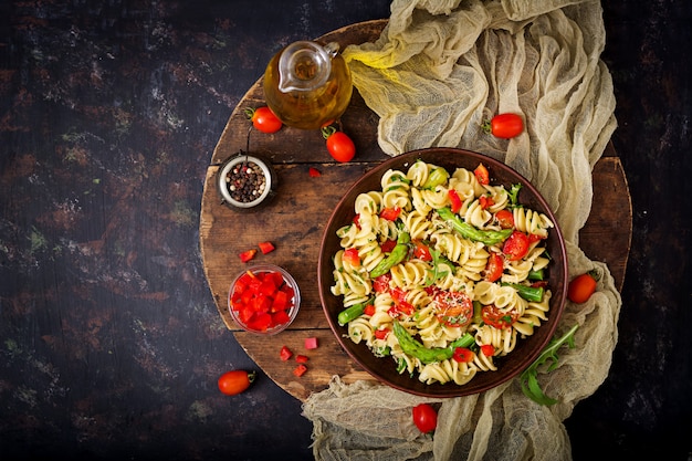 Salad - fusilli pasta with tomatoes, asparagus and sweet pepper