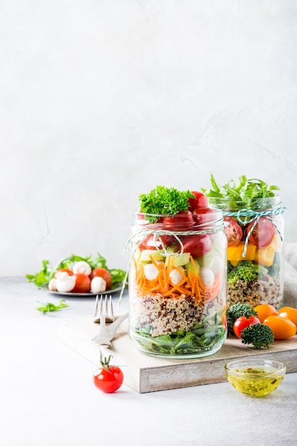 Salad in glass jar with quinoa