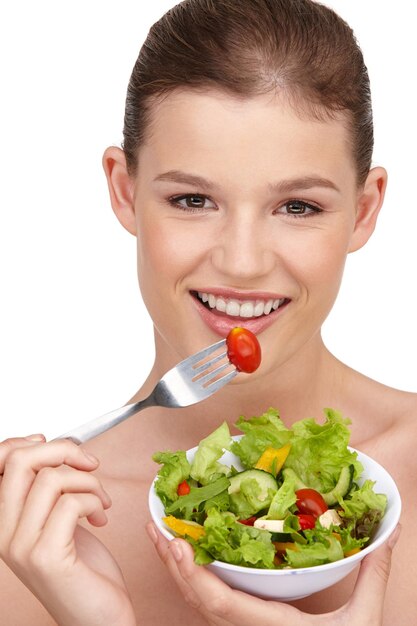 salad health and portrait of woman in studio with wellness for weight loss with vegetables diet food and face of female person isolated on white background with smile for healthy organic meal