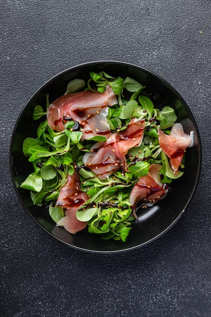 salad jamon aged meat ham fresh healthy meal food snack on the table copy space food background