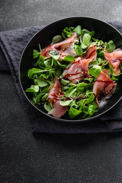 salad jamon ham meat fresh meal food snack on the table copy space food background rustic top view