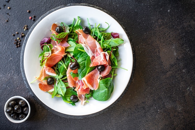 salad jamon prosciutto green leaves mix lettuce olives vegetables meat snack