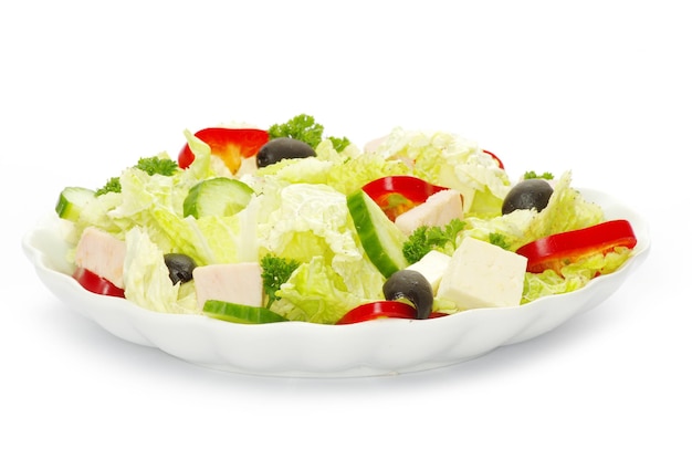 Salad in plate on white