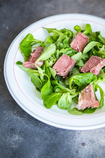 salad pork tongue green salad petals mix cuisine fresh healthy meal food snack diet on the table