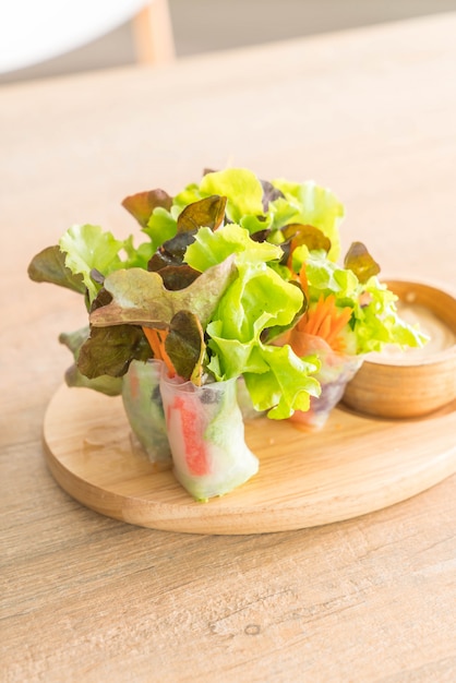 salad roll on wood plate