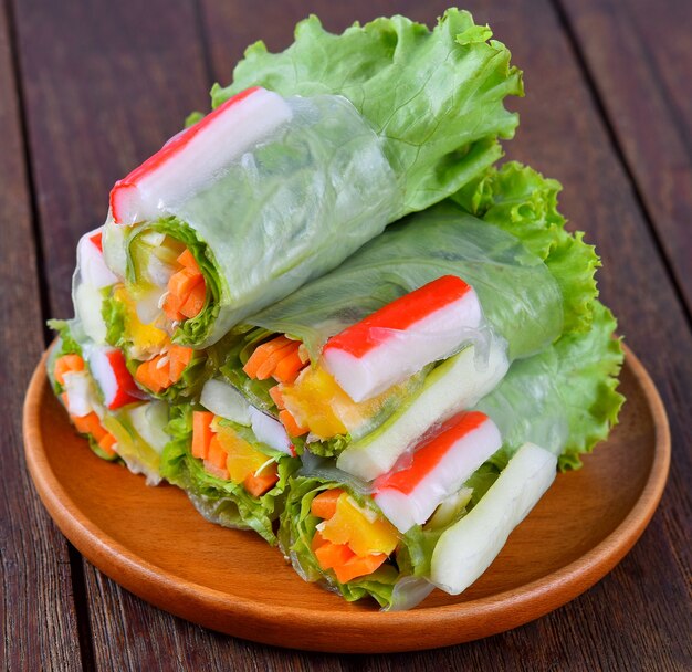 Salad rolls on table