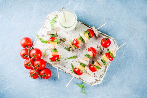 Salad sandwiches skewers