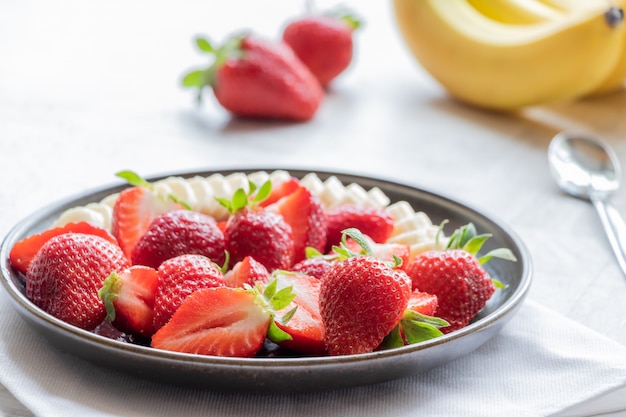 Salad of strawberries and banana. 