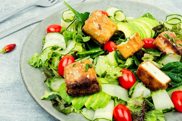 Salad of tofu and fresh vegetables healthy eating