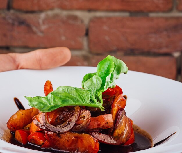 Salad of tomatoes onions basil in soy sauce