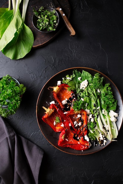 Salad with baked pepper feta cheese and pak choi Dressing from balsamic sauce Vegetarian salad