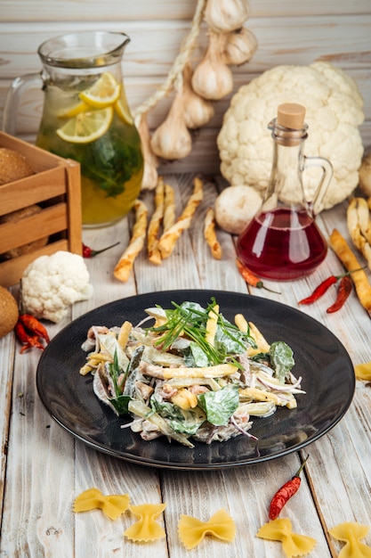 Salad with beef tongue and fries