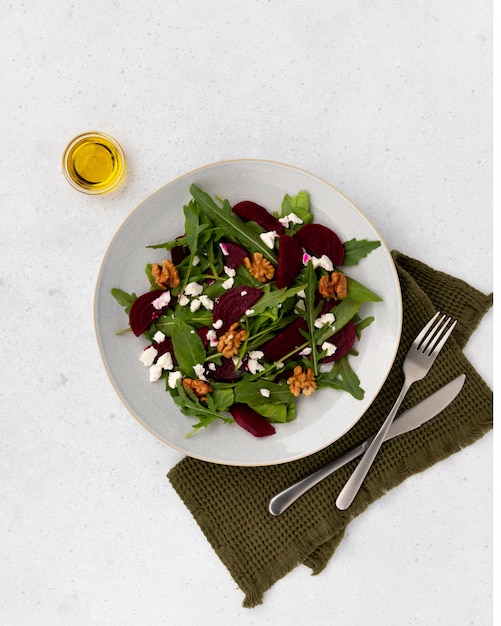 Salad with beetroot, cheese, walnut and arugula