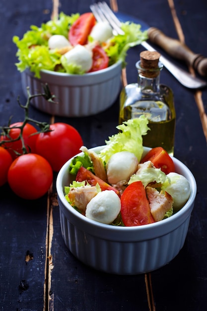 Salad with chicken, tomato and mozzarella