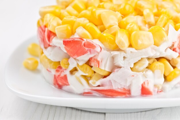 Salad with corn and crab sticks mayonnaise