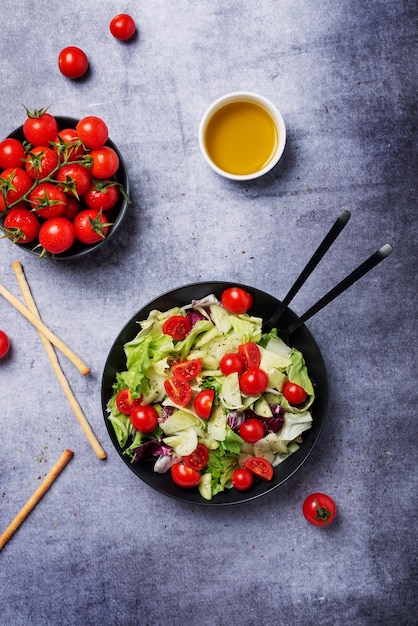 Salad with cucumber, tomato, green salad and chicory