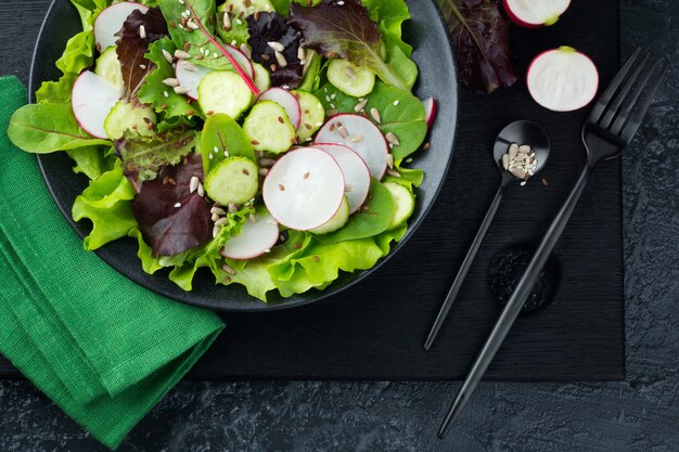 Salad with fresh radishes and sesame seeds