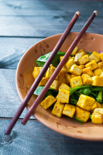 Salad with fried tofu and spinach