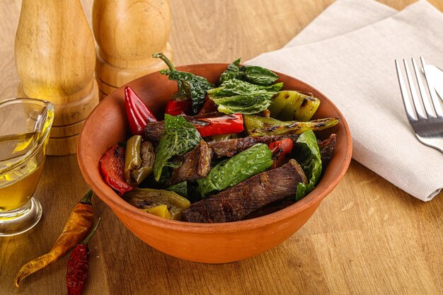 Salad with grilled beef steak letucce and pepper