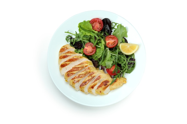 Salad with grilled chicken isolated on white background