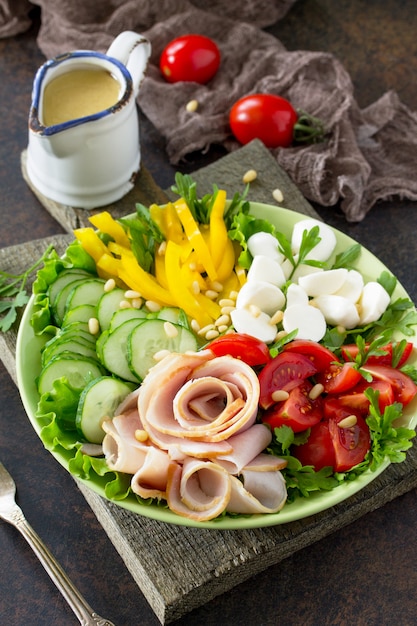 Salad with ham and fresh vegetables