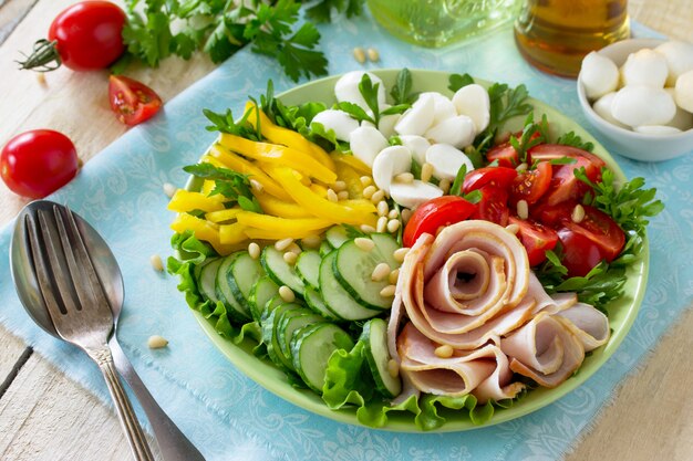 Salad with ham and fresh vegetables